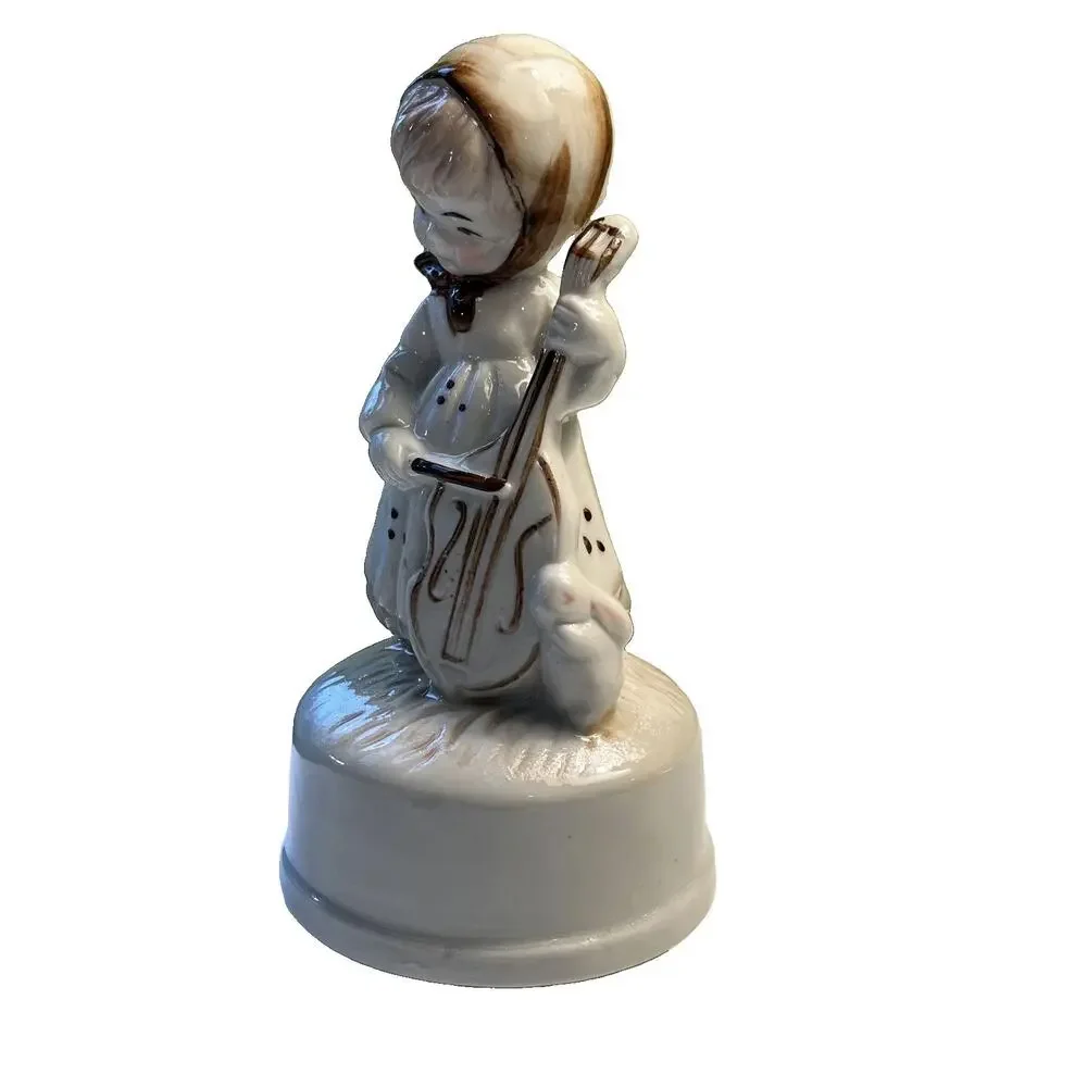 Vintage bisque girl playing cello W/ Bunny music box 1983 tune “feelings” W/BOX